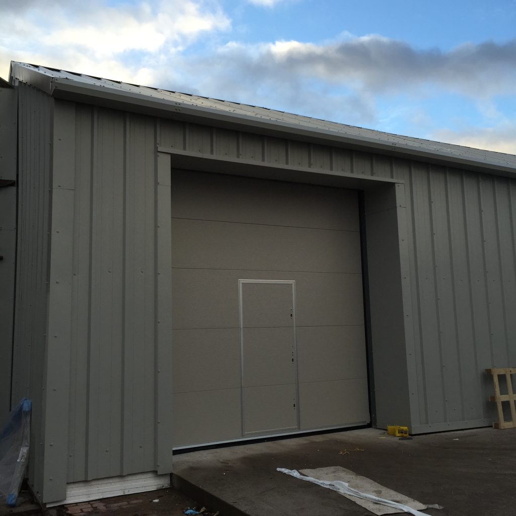 Industrial unit with roller shutter door